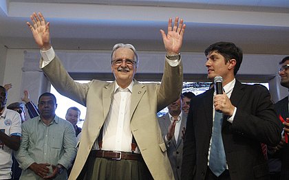 Schmidt ao lado do interventor Carlos Rátis durante a sua posse como presidente